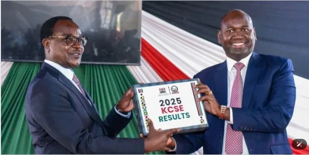 Education CS Julius Ogamba and PS Julius Bitok, during the release of the 2025 KCSE results at the AIC Chebisaas High School in Eldoret, Uasin Gishu County, on January 9, 2025. Photo MOE